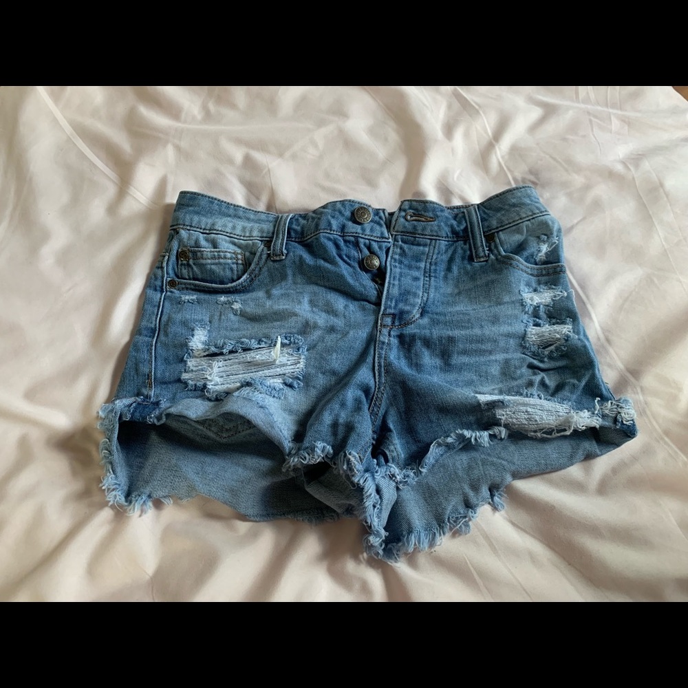 Distressed denim shorts